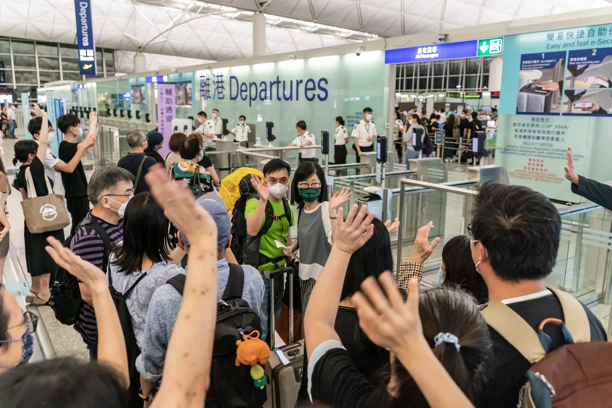 The departure gate at Hong Kong International Airport. Since China introduced its sweeping national security law, tens of thousands have made plans to leave. Anthony Kwan for The New York Times